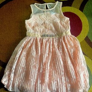 Peach lace little girls formal dress pretty enough for a summer wedding.